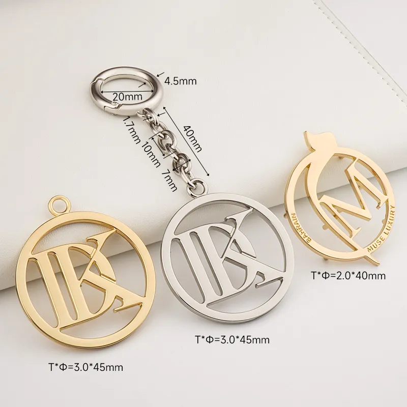circle metal tag with custom logo hanging for bags