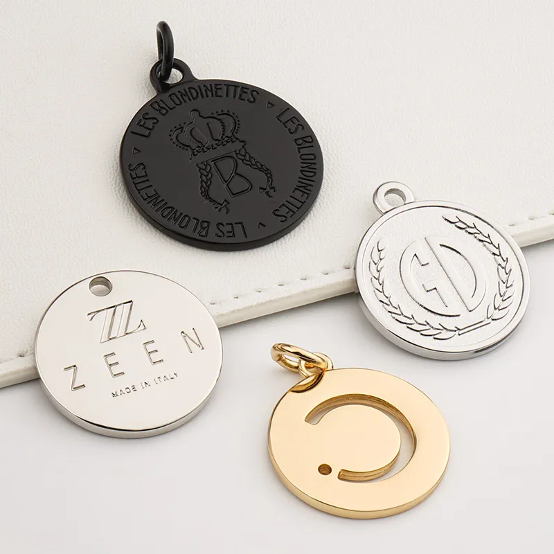 customize round metal logo tag in gold silver and black