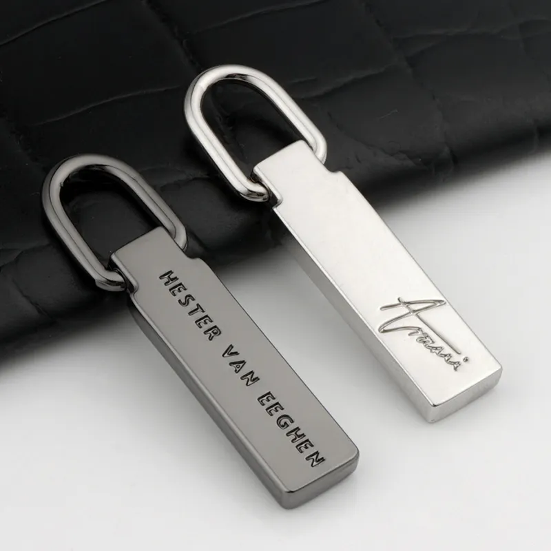 gunmetal and silver metal zip pull for bags