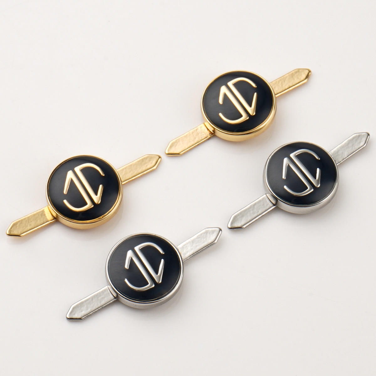 small metal logo tag with clasp for purses
